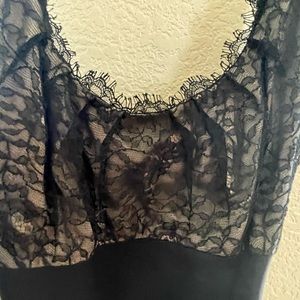 Cocktail dress with a bit of lace fringe on the top.